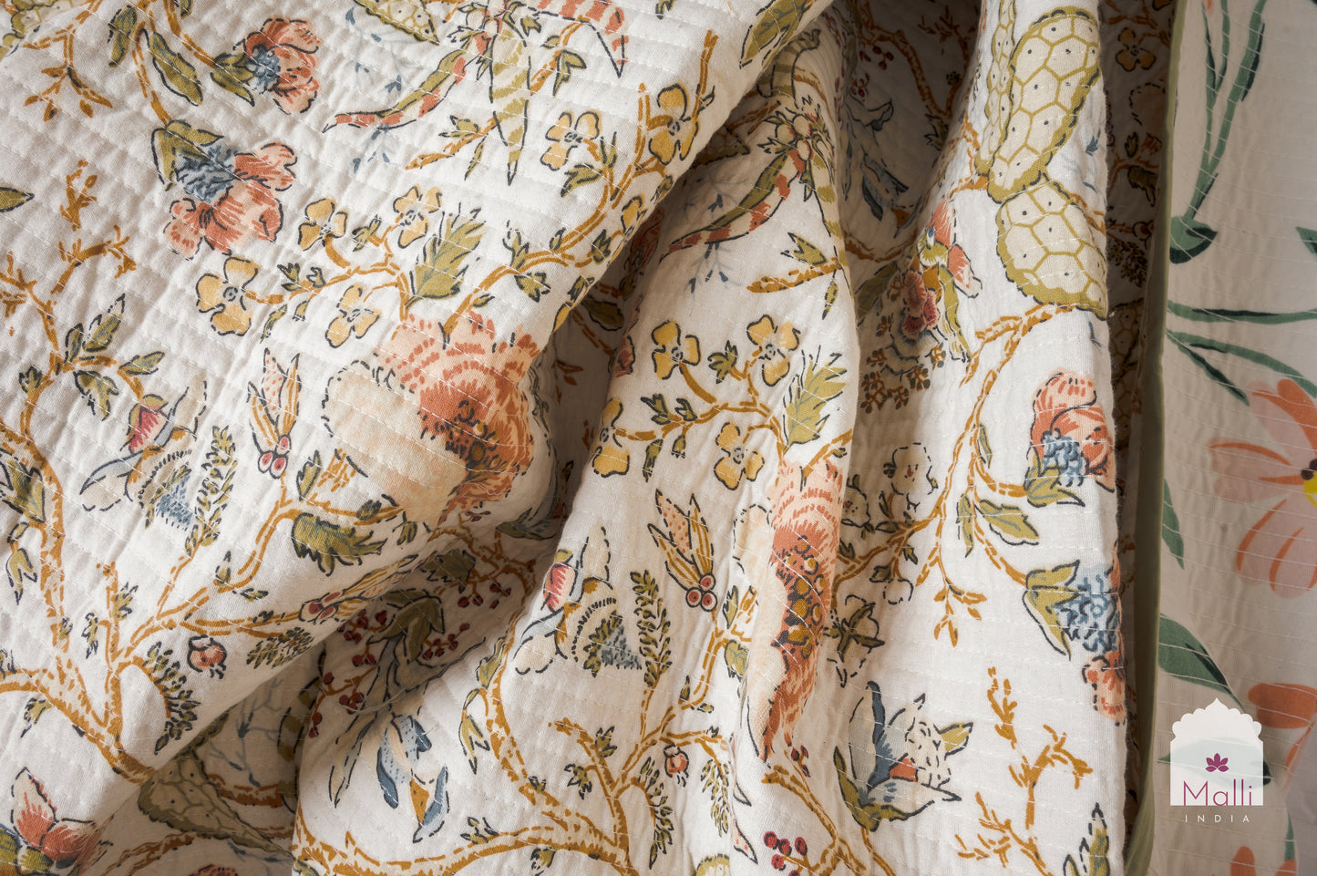 Rust orange bloom on cream base - Quilted reversible bedcover in pure cotton