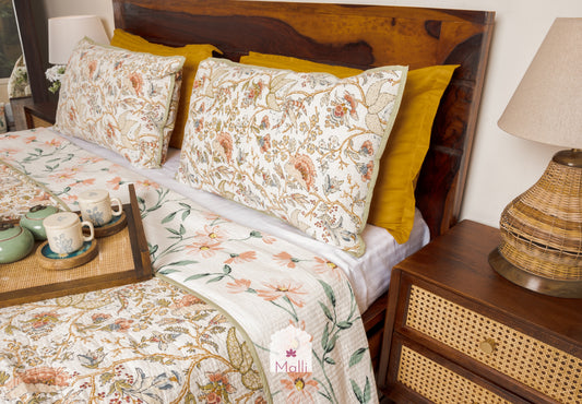 Rust orange bloom on cream base - Quilted reversible bedcover in pure cotton