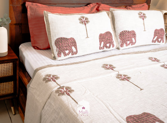 Pink elephant & palm bedcover in slub cotton
