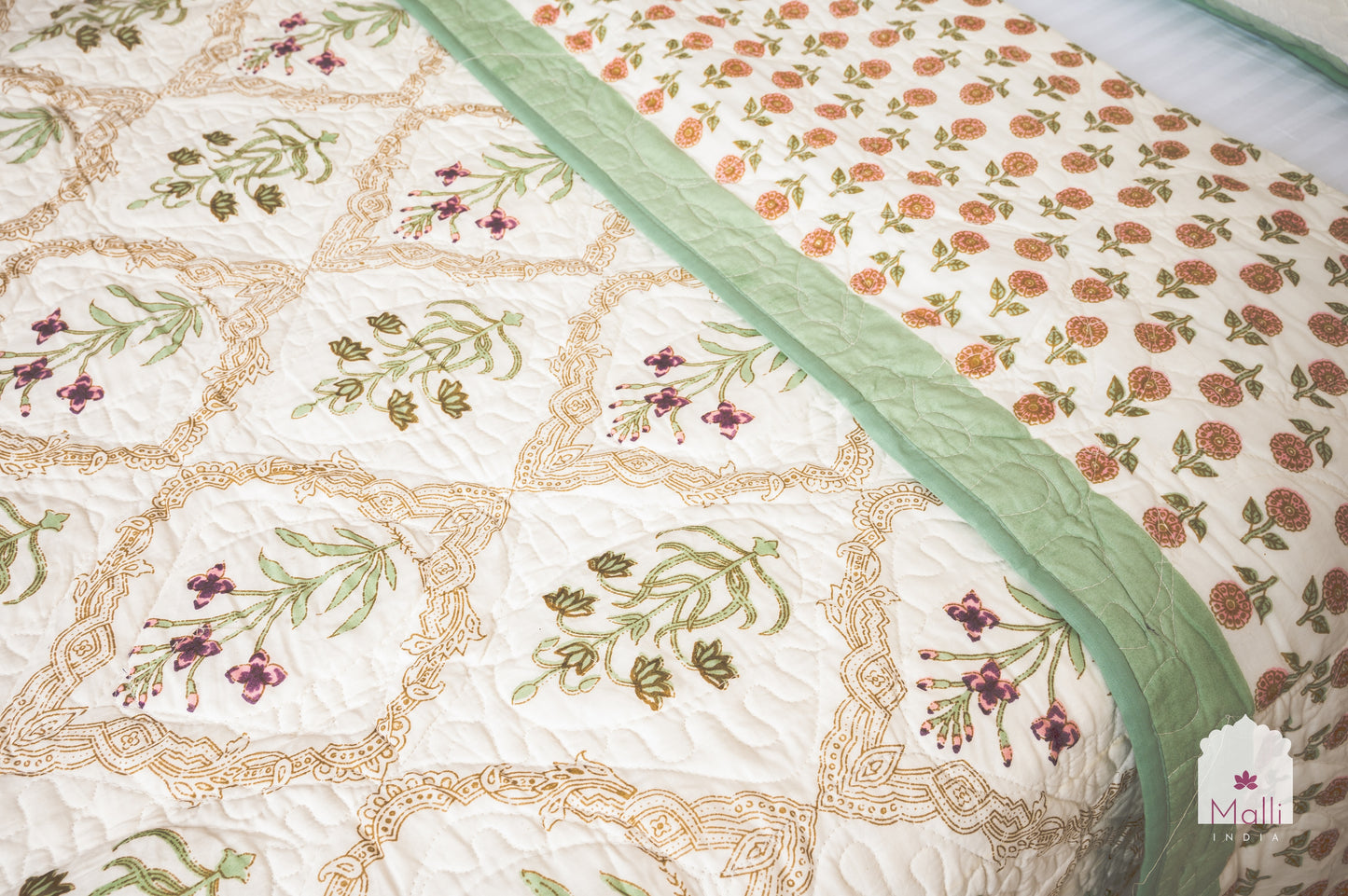 Pink madhumalti jaal - Quilted reversible bedcover in pure mulmul cotton