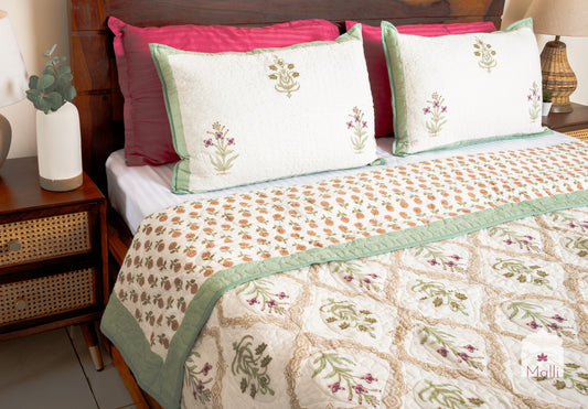 Pink madhumalti jaal - Quilted reversible bedcover in pure mulmul cotton