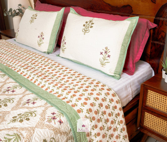Pink madhumalti jaal - Quilted reversible bedcover in pure mulmul cotton