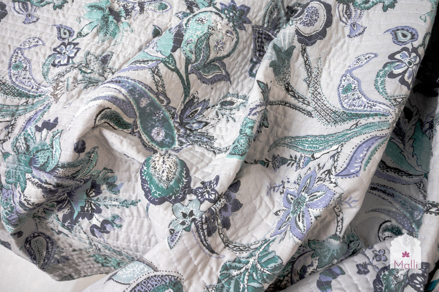 Blue bloom on light grey base - Quilted reversible bedcover in pure cotton