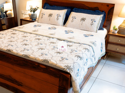 Tulip jaal with marigolds - Quilted reversible bedcover in pure mulmul cotton