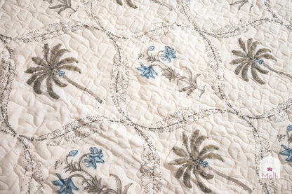 Tulip jaal with marigolds - Quilted reversible bedcover in pure mulmul cotton