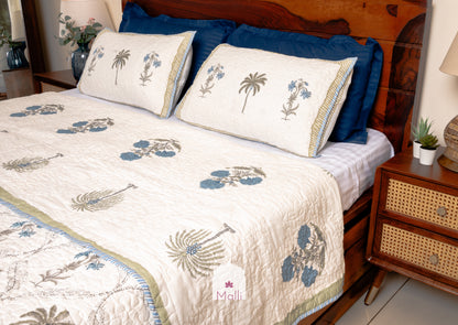 Tulip jaal with marigolds - Quilted reversible bedcover in pure mulmul cotton