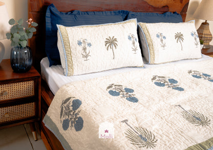 Tulip jaal with marigolds - Quilted reversible bedcover in pure mulmul cotton