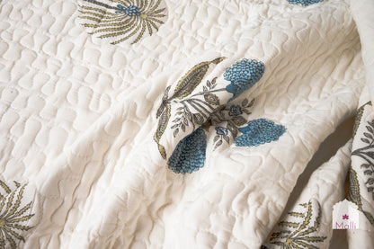 Marigold, palm and sunflower jaal - Quilted reversible bedcover in pure mulmul cotton