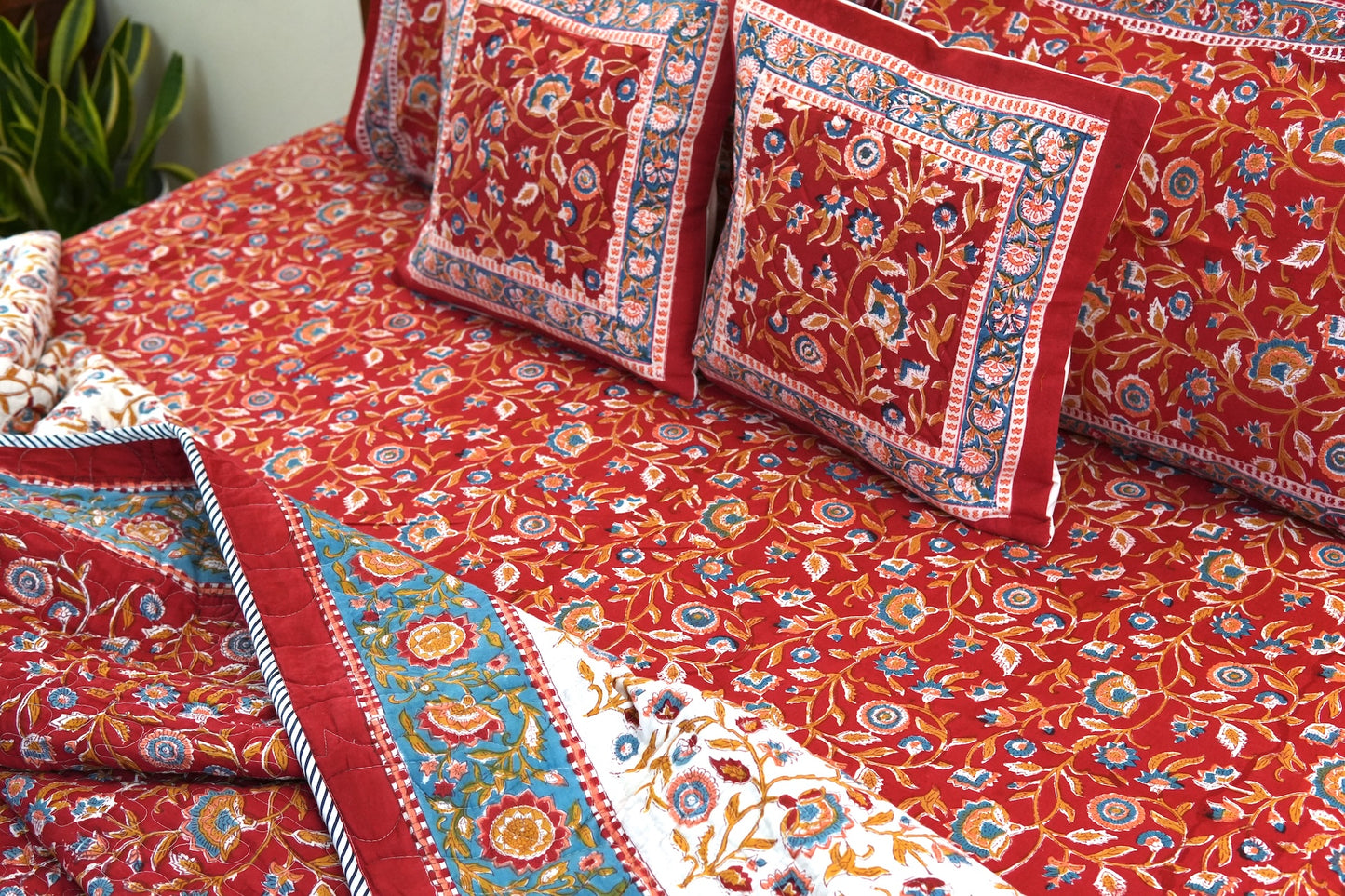 Red blooming gardens handblock printed pure mulmul comforter with cotton bedsheet and 2 cushions - 6 pieces bedding set (King / Queen Size)