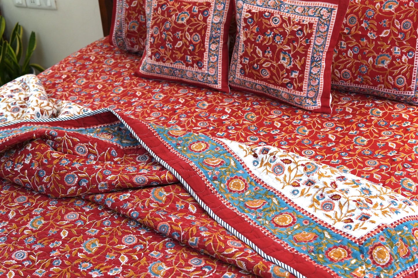 Red blooming gardens handblock printed pure mulmul comforter with cotton bedsheet and 2 cushions - 6 pieces bedding set (King / Queen Size)