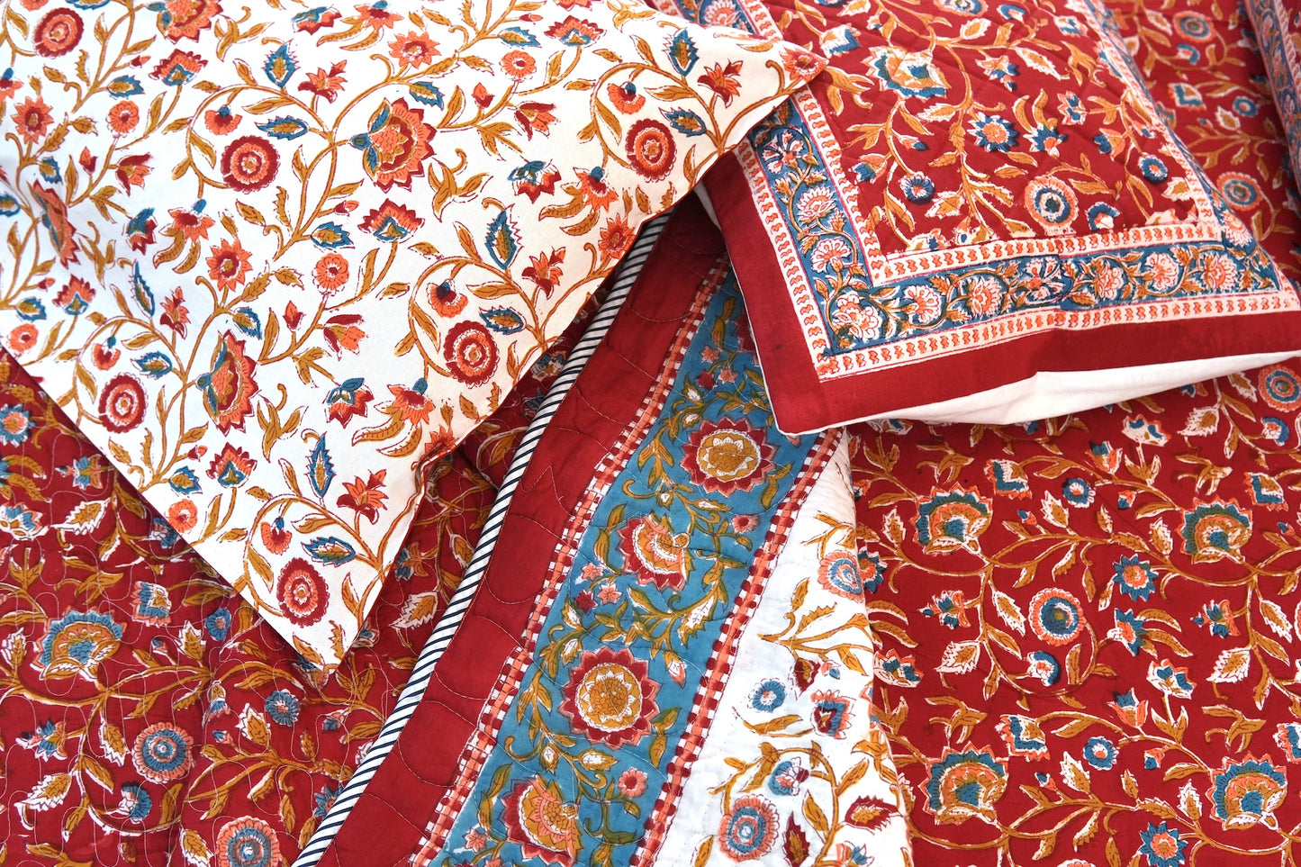 Red blooming gardens handblock printed pure mulmul comforter with cotton bedsheet and 2 cushions - 6 pieces bedding set (King / Queen Size)