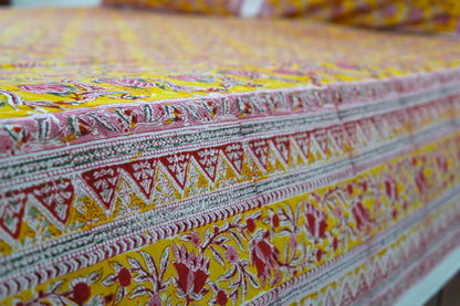 Pink bloom on yellow handblock printed pure mulmul dohar with cotton bedsheet - 4 pieces bedding set (King / Queen Size)