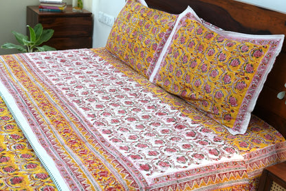 Pink bloom on yellow handblock printed pure mulmul dohar with cotton bedsheet - 4 pieces bedding set (King / Queen Size)