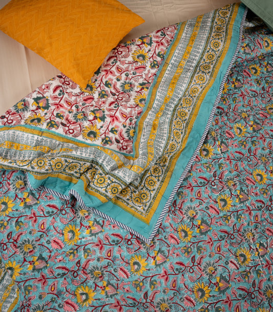 Orchard on blue - Handblock printed pure mulmul cotton reversible quilt